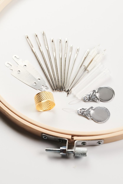 artist working on embroidery hoop